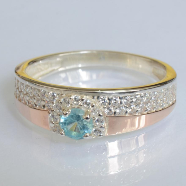 Срібна каблучка з золотими вставками