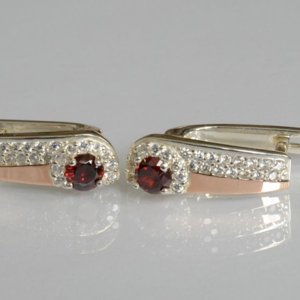 Срібні сережки з золотими пластинами