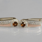 Срібні сережки з золотими пластинами