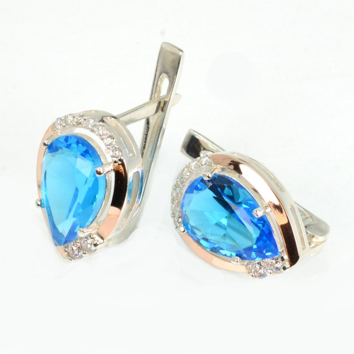 Срібні сережки з золотими пластинами