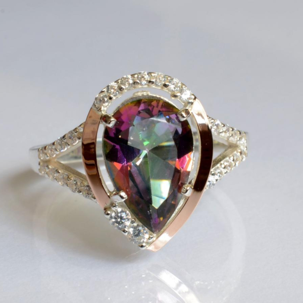 Серебряное кольцо с золотыми вставками