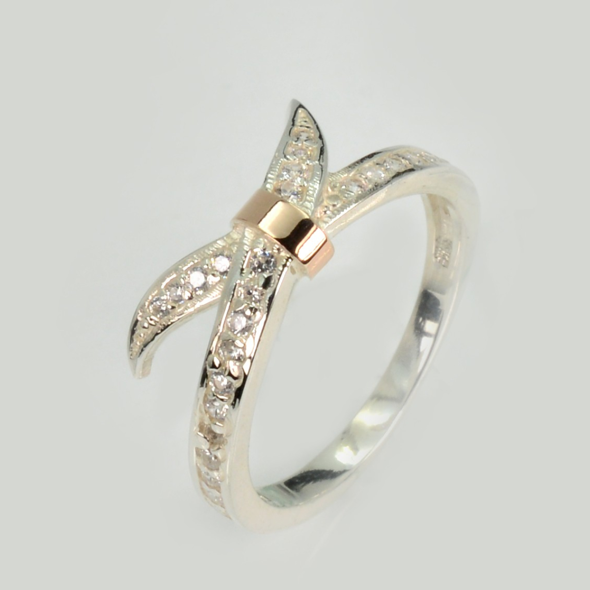 Срібна каблучка з золотими вставками