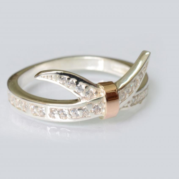 Срібна каблучка з золотими вставками