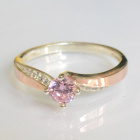 Срібна каблучка з золотими вставками