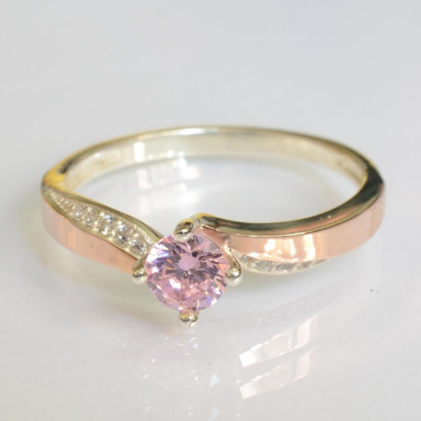 Срібна каблучка з золотими вставками