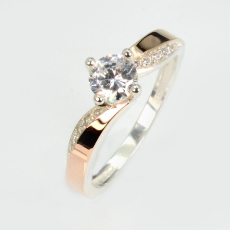 Срібна каблучка з золотими вставками