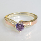 Срібна каблучка з золотими вставками