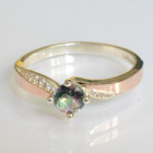 Срібна каблучка з золотими вставками