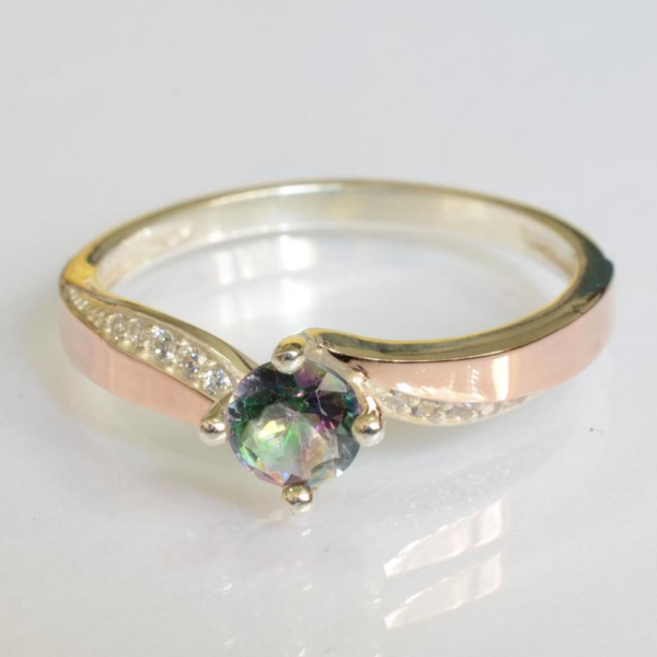 Срібна каблучка з золотими вставками