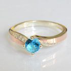 Срібна каблучка з золотими вставками