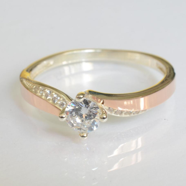 Срібна каблучка з золотими вставками