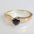 Срібна каблучка з золотими вставками