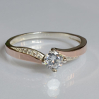 Срібна каблучка з золотими вставками