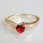 Срібна каблучка з золотими вставками