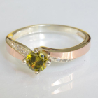 Срібна каблучка з золотими вставками