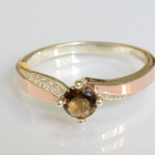 Срібна каблучка з золотими вставками