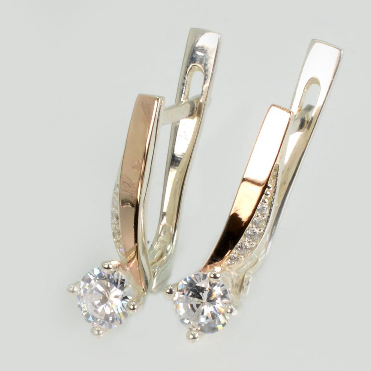 Срібні сережки з золотими пластинами