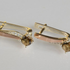 Срібні сережки з золотими пластинами