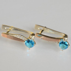 Срібні сережки з золотими пластинами