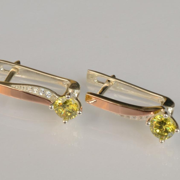 Срібні сережки з золотими пластинами