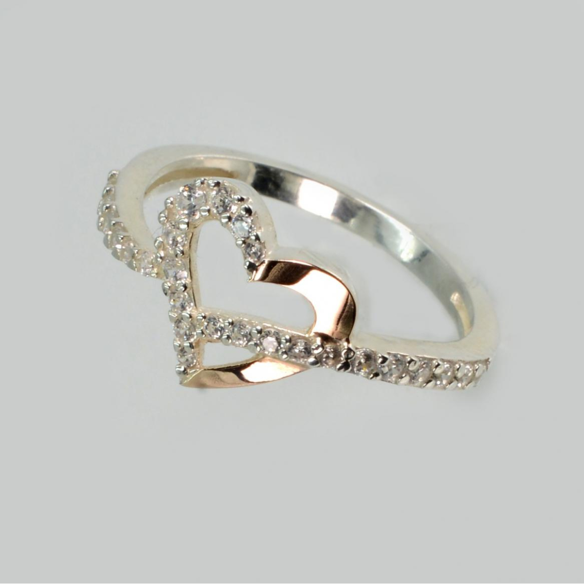 Срібна каблучка з золотими вставками