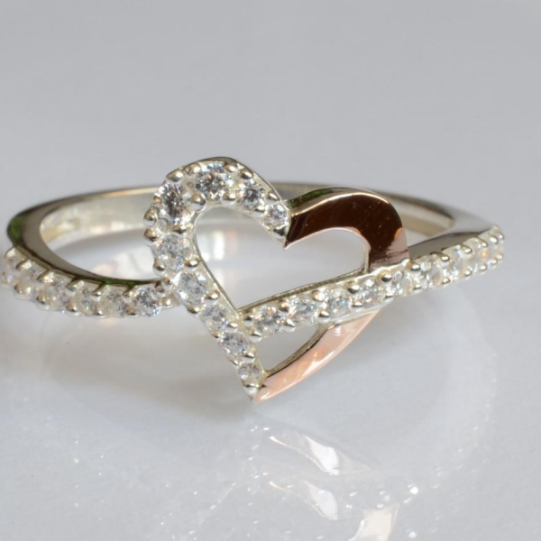 Срібна каблучка з золотими вставками