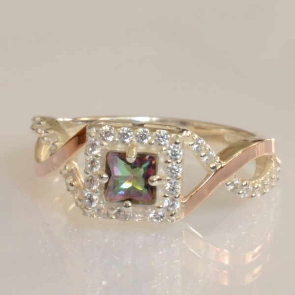 Срібна каблучка з золотими вставками