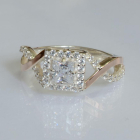 Срібна каблучка з золотими вставками