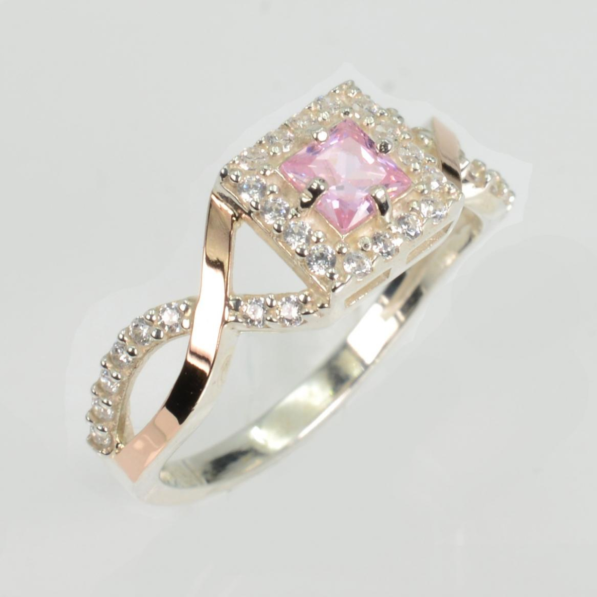 Срібна каблучка з золотими вставками