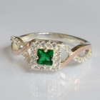 Срібна каблучка з золотими вставками