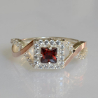 Срібна каблучка з золотими вставками