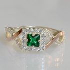 Срібна каблучка з золотими вставками