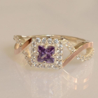 Срібна каблучка з золотими вставками