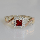 Срібна каблучка з золотими вставками