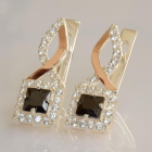 Серебряные серьги с золотыми пластинами