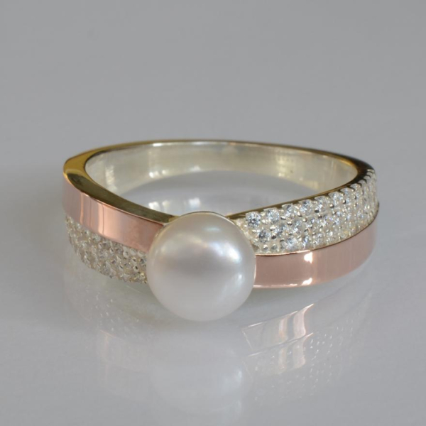 Срібна каблучка з золотими вставками