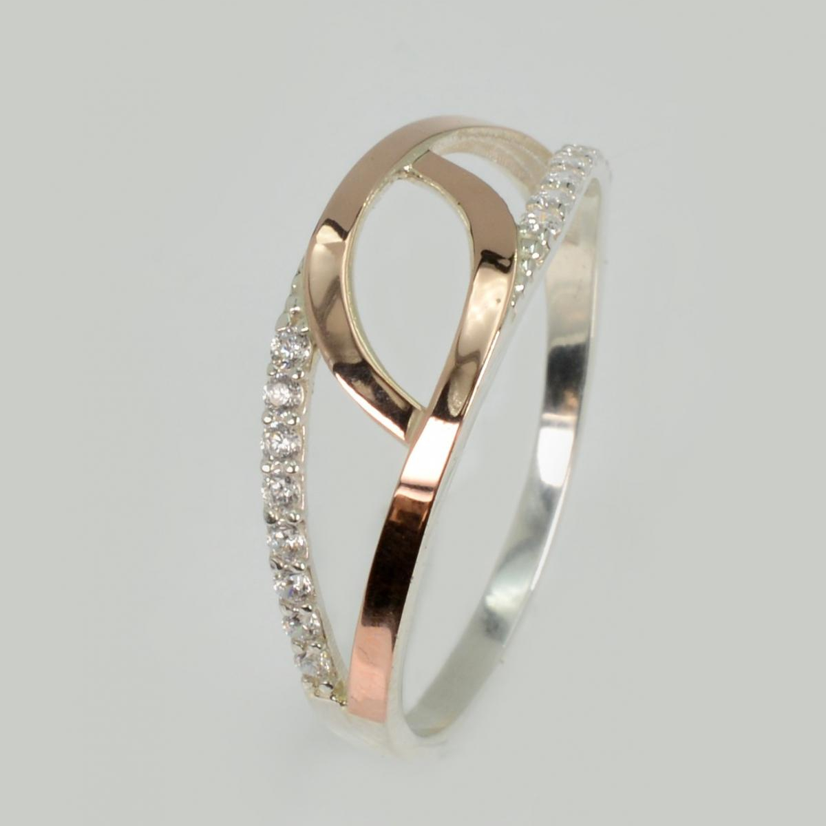 Срібна каблучка з золотими вставками