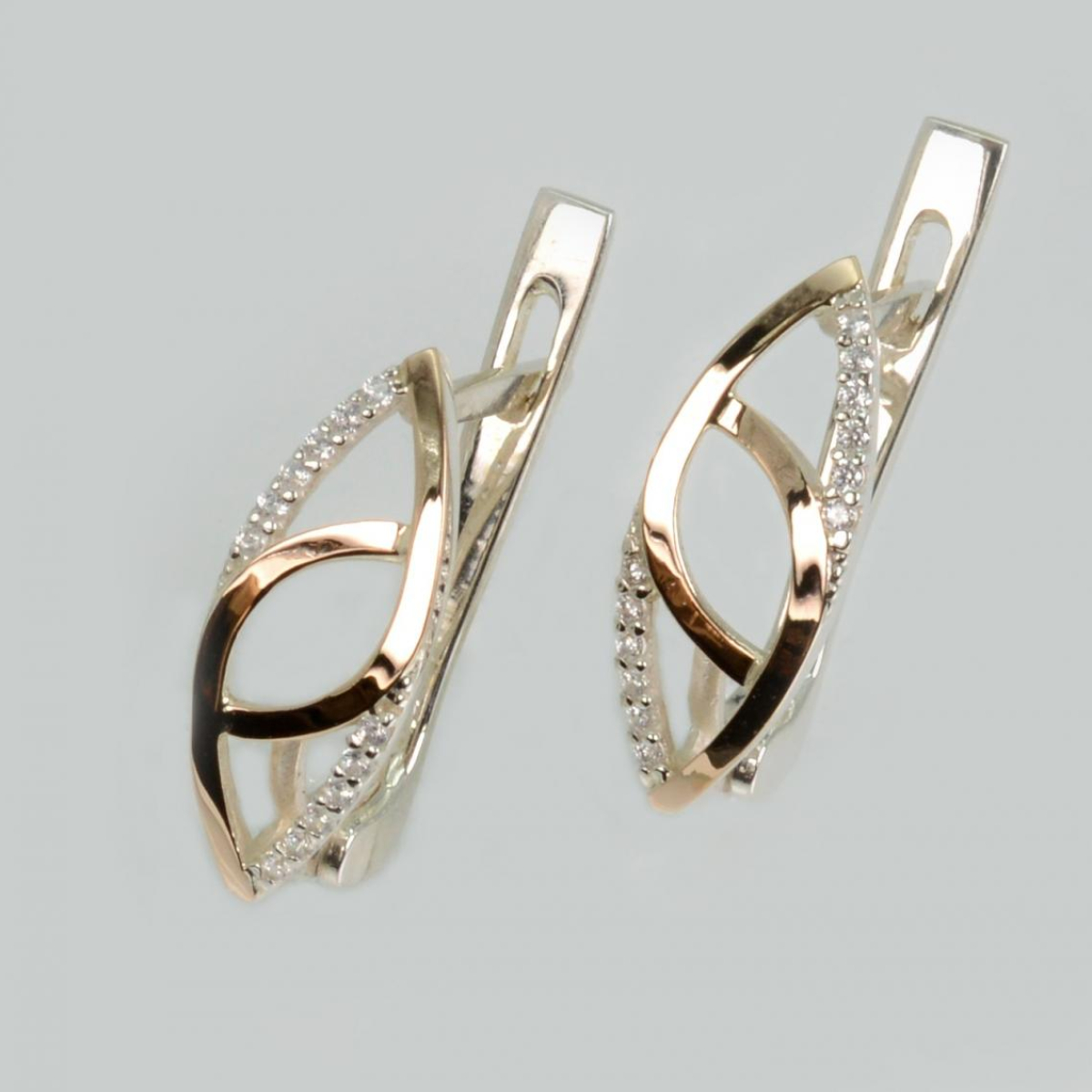 Срібні сережки з золотими пластинами