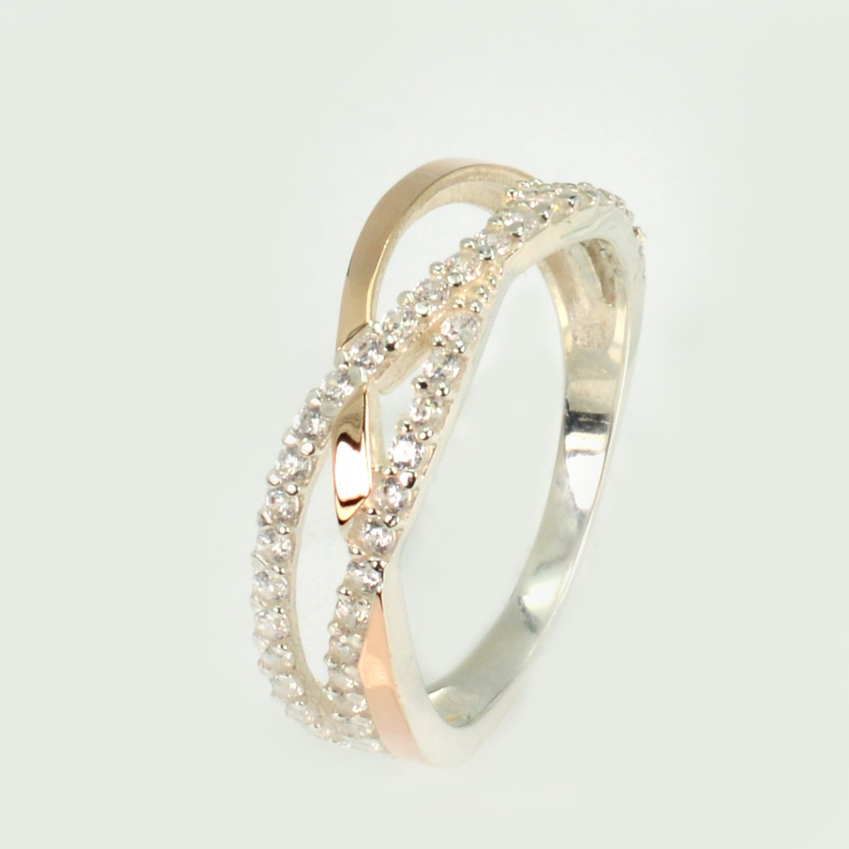 Срібна каблучка з золотими вставками