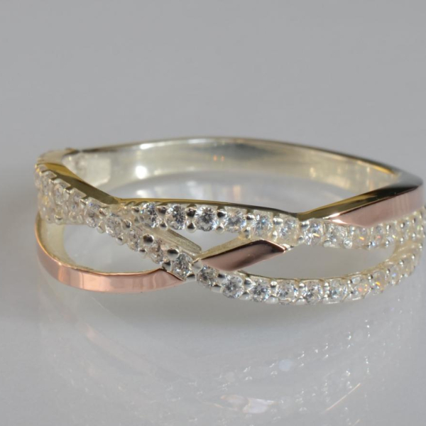 Срібна каблучка з золотими вставками