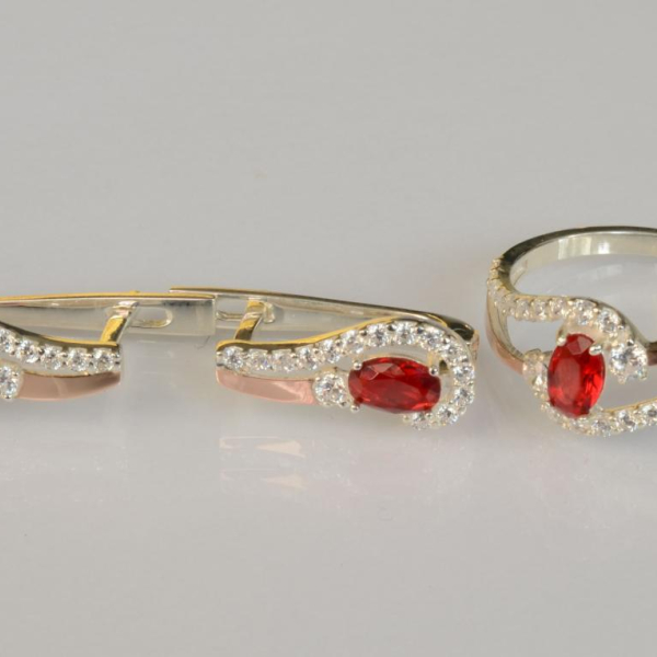 Срібний набір з золотими пластинами