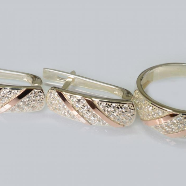 Срібний набір з золотими пластинами