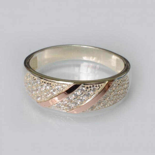 Срібна каблучка з золотими вставками