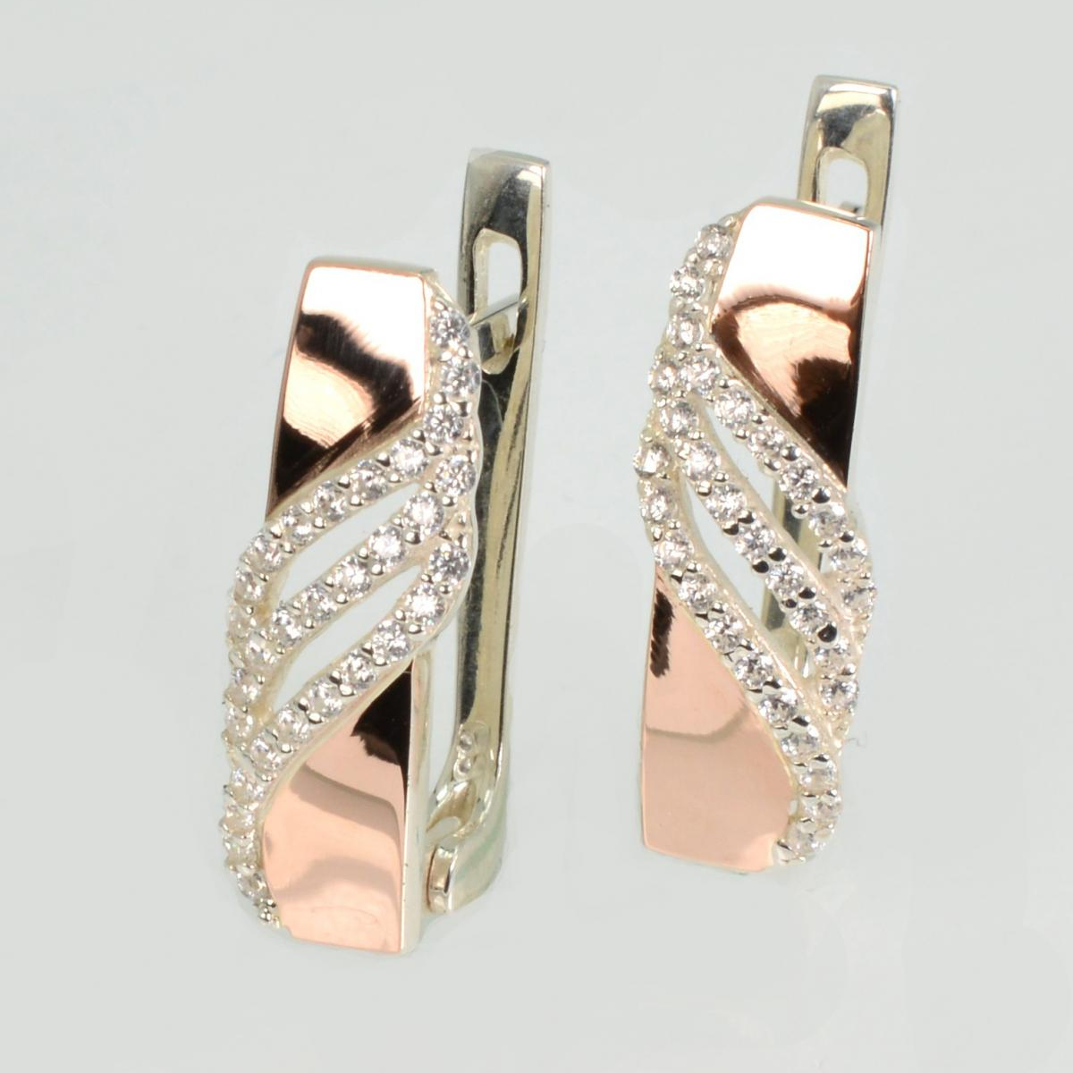 Срібні сережки з золотими пластинами