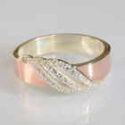 Срібна каблучка з золотими вставками