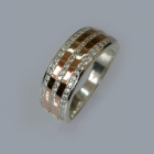 Срібна каблучка з золотими вставками