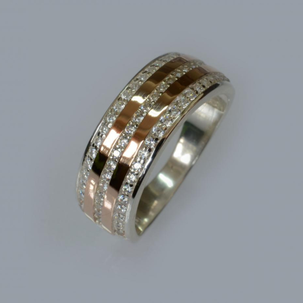 Срібна каблучка з золотими вставками