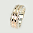 Срібна каблучка з золотими вставками