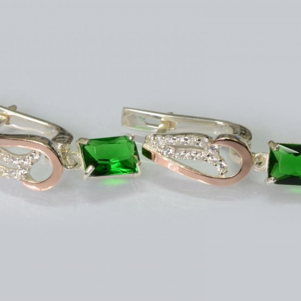 Срібні сережки з золотими пластинами