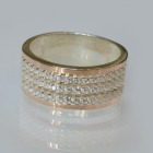 Срібна каблучка з золотими вставками